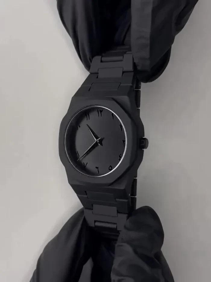 Black Aura watch with Eastern Arabic Numerals